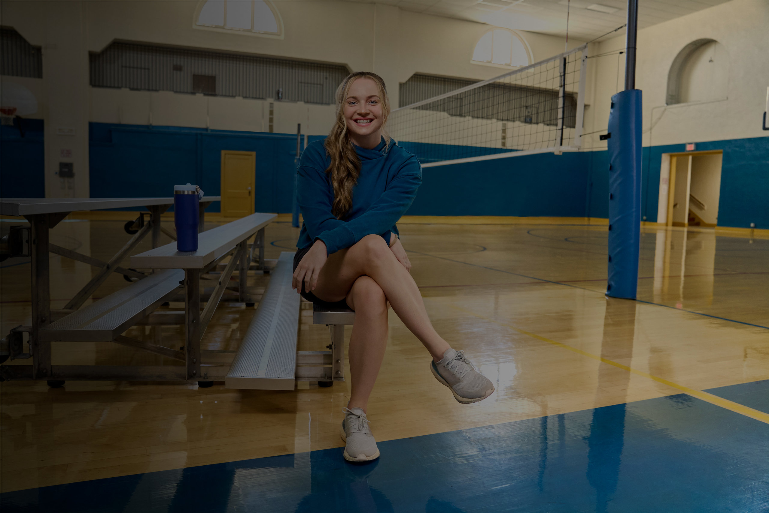Hero image of Caylee on volleyball court